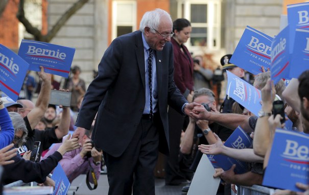 Senator Bernie Sanders greets supporters at a campaign rally outside the New Hampshire State House on November 5, 2015. Reuters/Brian Snyder