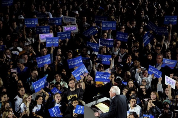 The crowd cheers as U.S. Democratic presidential candidate Bernie Sanders speaks at a campaign rally and concert at the University of Iowa in Iowa City, Iowa January 30, 2016. REUTERS/Mark Kauzlarich - RTX24R4K