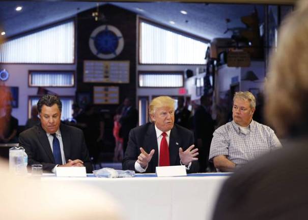 Donald Trump meets with active and retired law enforcement officials at the Fraternal Order of Police in Akron, Ohio, in August.